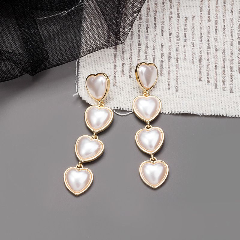 Fashion Long Heart Shaped Full Pearl Alloy Drop Earrings Wholesale