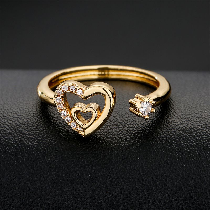 خاتم بتصميم بسيط مطلي بالذهب عيار 18 قيراط على شكل قلب خاتم مفتوح من الزركون