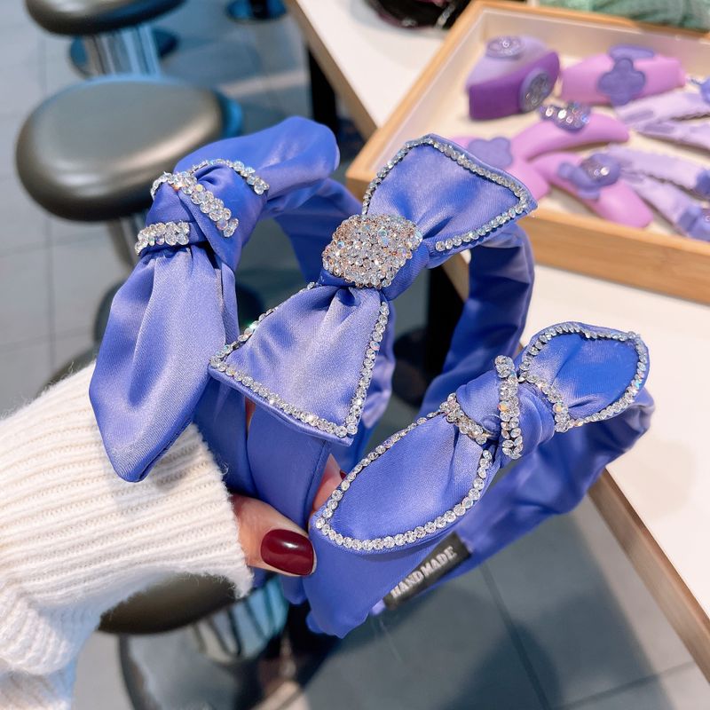 Mode Einfarbig Lila Eingelegt Strass Bogenförmigen Stirnband Großhandel