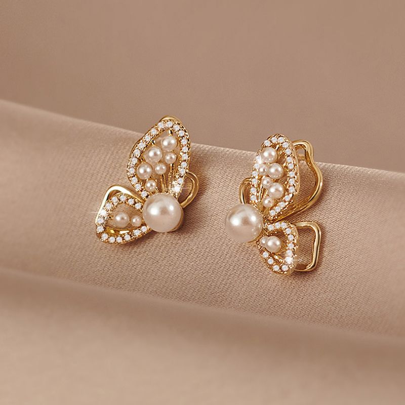 Style Coréen Papillon Alliage Perles Artificielles Boucles D'Oreilles