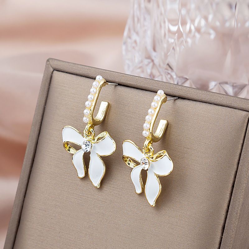 Fashion Drop Oil Bow Pearl Sweet Elegant Alloy Earrings