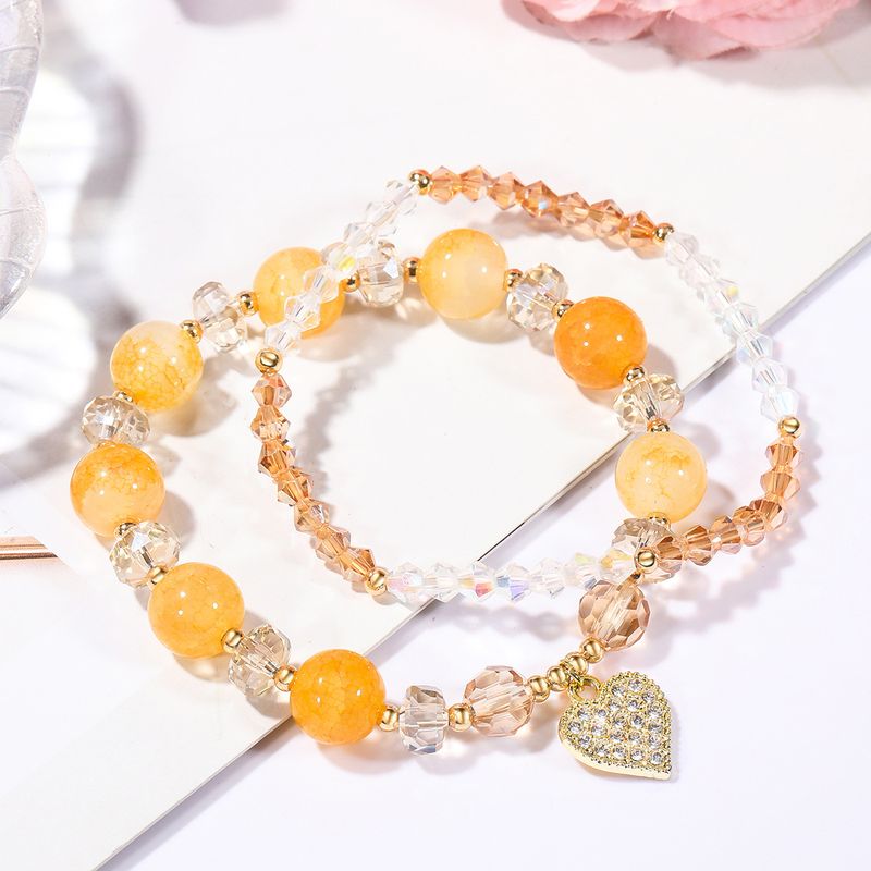 Zweiteiliges Orangefarbenes Kristall-herz-anhänger-transfer-perlen-armband