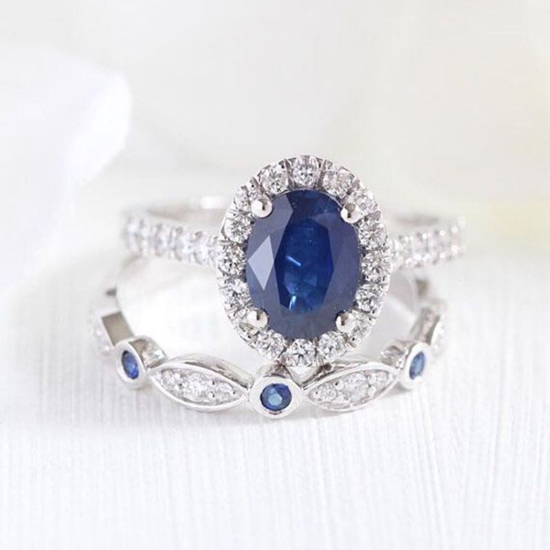 Fashion Egg-shaped Treasure Sapphire Inlaid White Diamond Alloy Ring