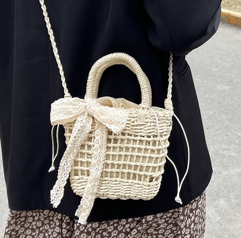 Simple Hollow Flower Bow Woven Straw Messenger Bag 15*18*8