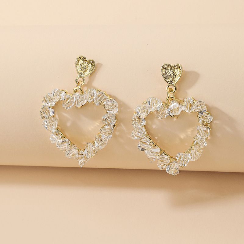 Korean Style Inlaid Crystal Heart Shaped Hollowed Alloy Stud Earrings Wholesale
