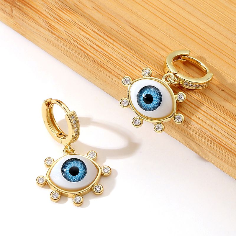 Fashion Blue Eye-shaped Inlaid Zircon Copper Earrings Wholesale