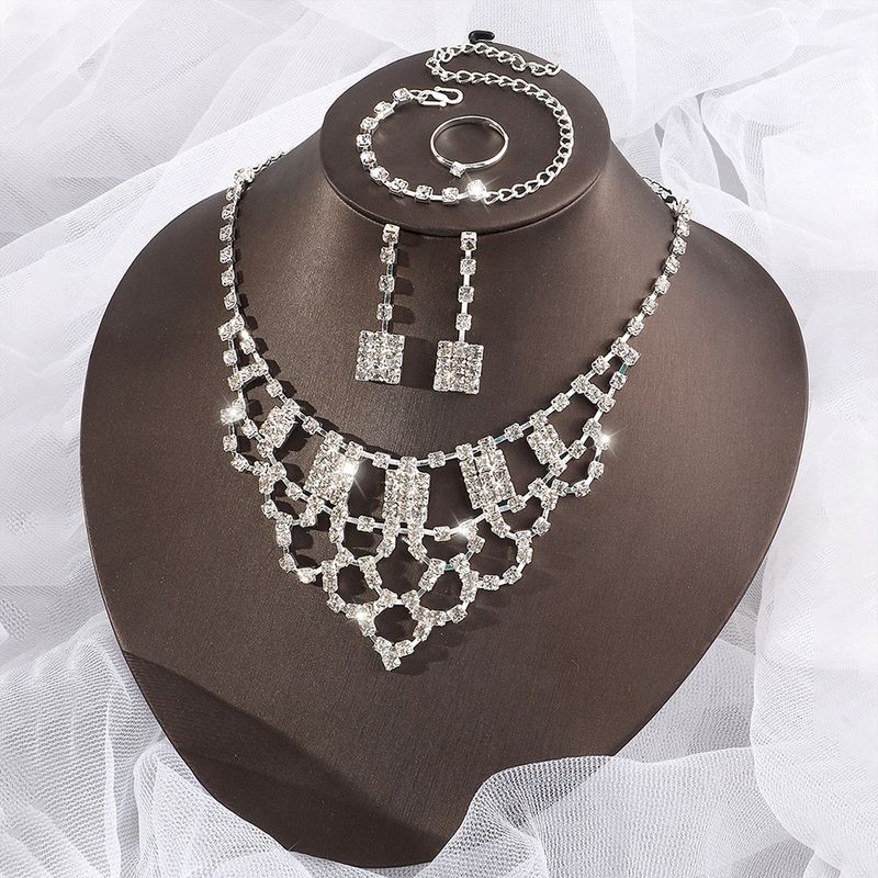 Fashion Simple Four-piece Jewelry Necklace Ring Bracelet Set Wholesale
