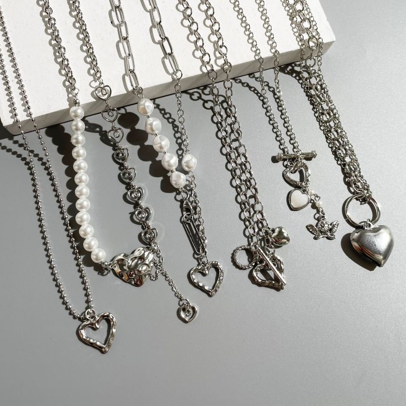 Mode Hohle Herzförmige Perle Schlüsselbeinkette Legierungshalskette