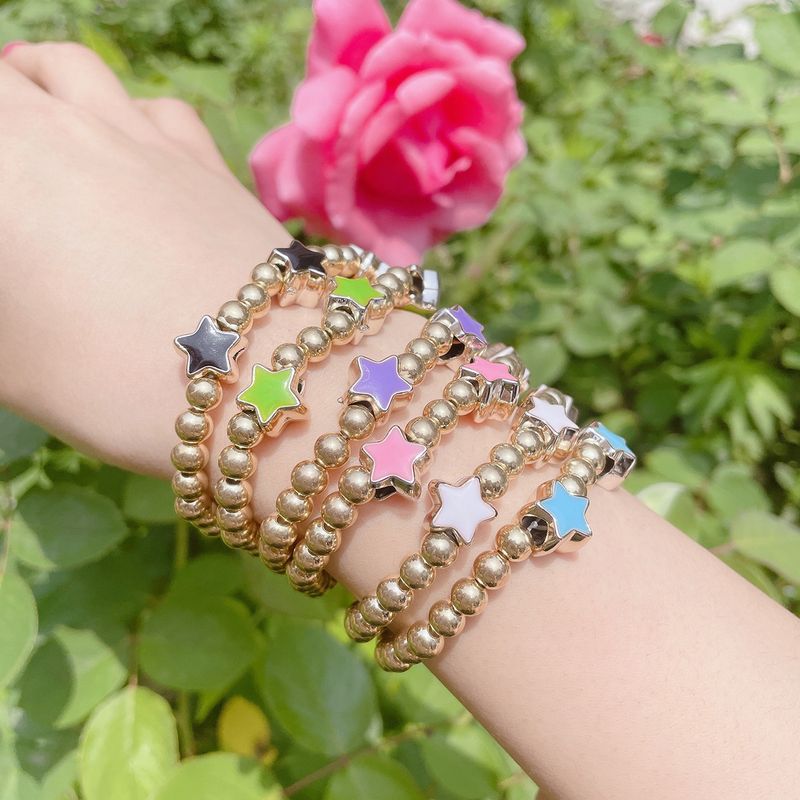 Conjunto De Pulsera Elástica Estrella Color Caramelo Multicapa Con Cuentas Doradas