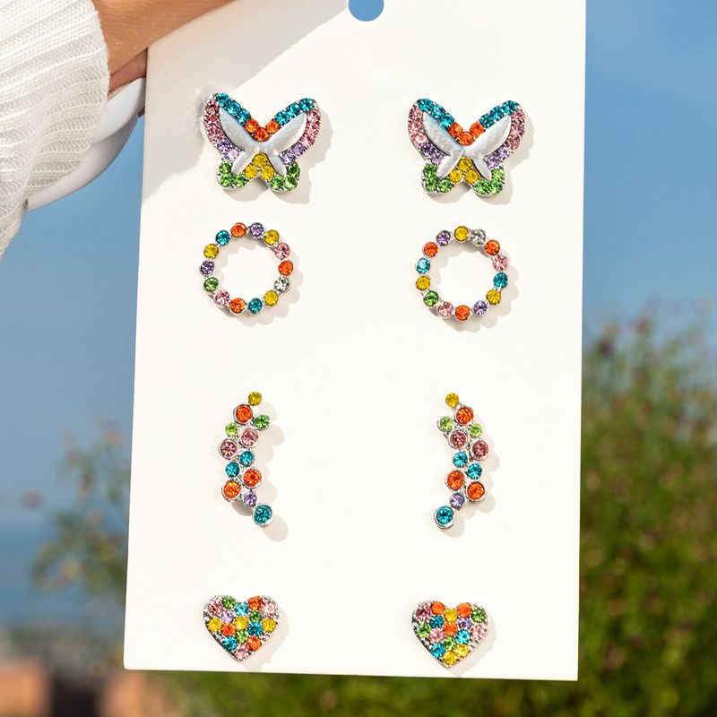 Einfache Unregelmäßige Farbe Diamant Schmetterling Herz Stud Ohrringe Vier-teiliges Set