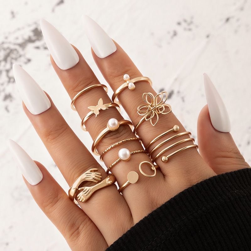 Ornament Hollow Flower Pearl Hand Butterfly Geometric Shaped Ring Eight-piece Set