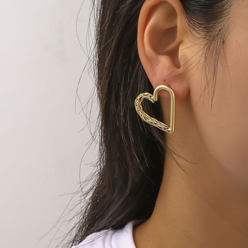 Simple Style Asymmetric Hollow Heart-shaped Metal Stud Earrings