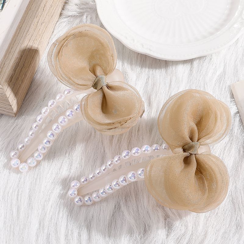 Women's Princess Sweet Bow Knot Synthetic Resin Synthetic Yarn Headwear Inlaid Pearls Artificial Pearl Hair Clip 1 Set