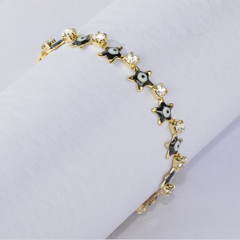 Simple Mode Étoiles Creative Oeil De Diable Plaqué 18k Or Alliage Bracelet