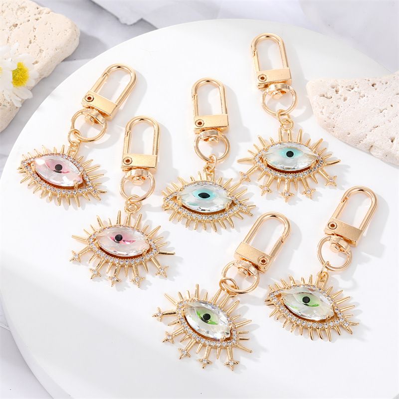 Fashion Alloy Inlaid  Rhinestone Eye Shaped Keychain Electroplated Gold Handbag Pendant