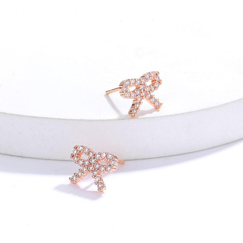 Fashion Ornament Copper Electroplated 18k Gold Inlaid Zircon Bow Earrings