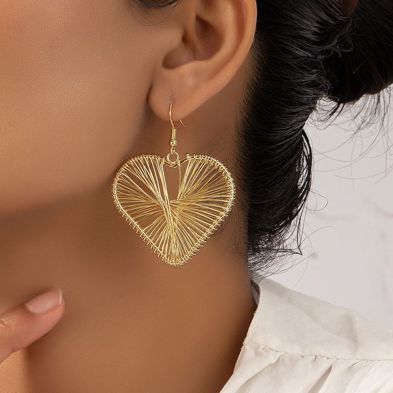 Simple Style Hollow Striped Three-dimensional Heart-shaped Pendant Earrings