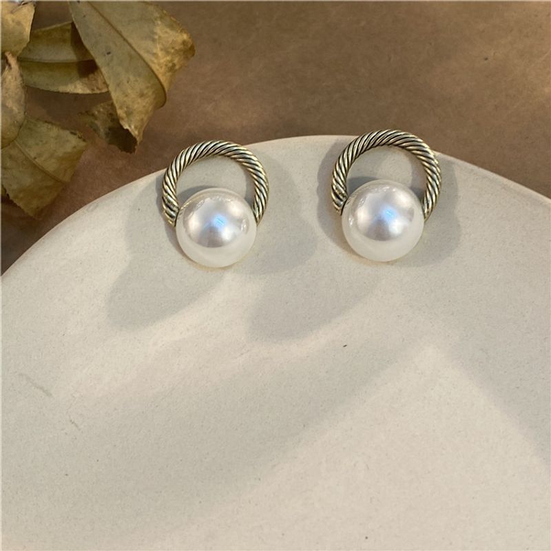 Style Vintage Tourner Alliage Placage Perles Artificielles Boucles D'oreilles