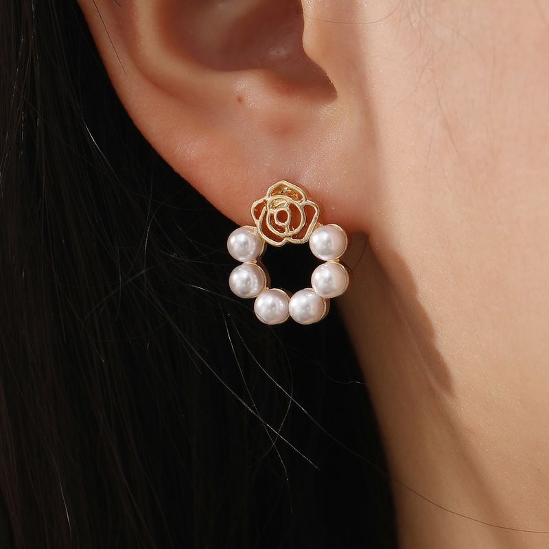 Sweet Flower Alloy Hollow Out Pearl Women's Ear Studs 1 Pair
