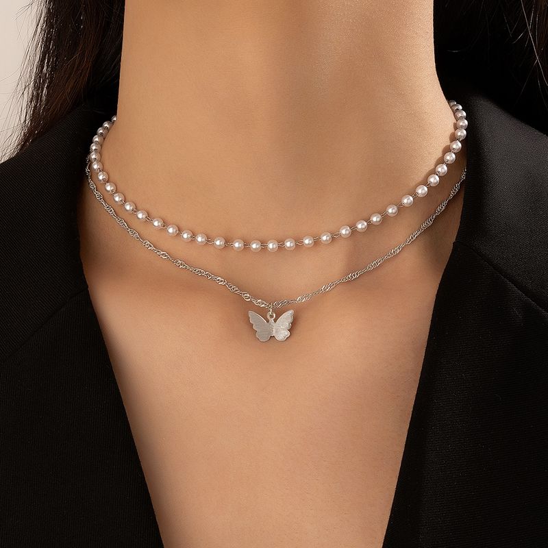 Simple Style Butterfly Alloy Artificial Pearls Women's Layered Necklaces