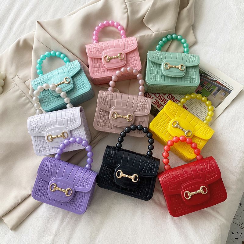 Mujeres Pequeña Pvc Color Sólido Moda Cuadrado Hebilla Magnética Bolsa De Gelatina