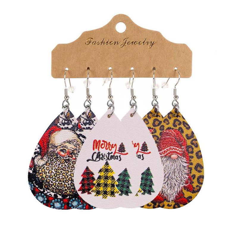 Fashion Christmas Tree Santa Claus Pu Leather Women's Earrings