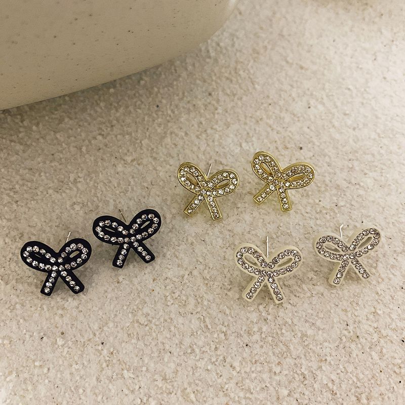 1 Pair Fashion Bow Knot Plastic Resin Inlay Artificial Diamond Women's Ear Studs
