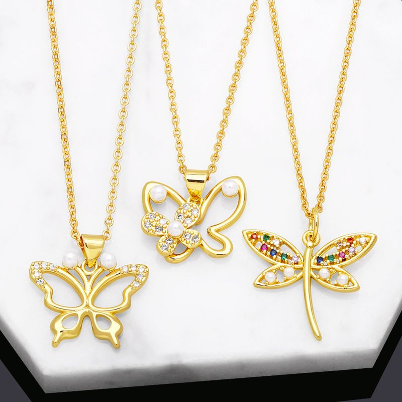 Simple Style Dragonfly Butterfly Copper Plating Hollow Out Artificial Pearls Zircon Pendant Necklace 1 Piece