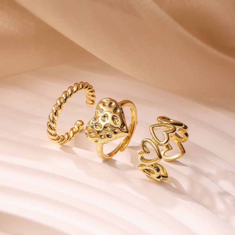 Vintage Style Simple Style Heart Shape Twist Copper 18k Gold Plated Zircon Rings In Bulk