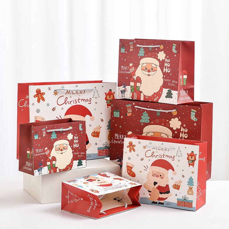 Weihnachten Cartoon-stil Weihnachtsmann Papierkarte Weihnachten Gruppe Geschenk Taschen
