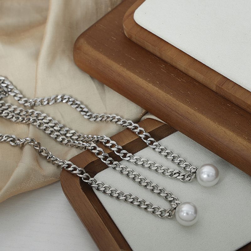 Großhandel Einfacher Stil Strassenmode Geometrisch Künstliche Perle Titan Stahl Halskette