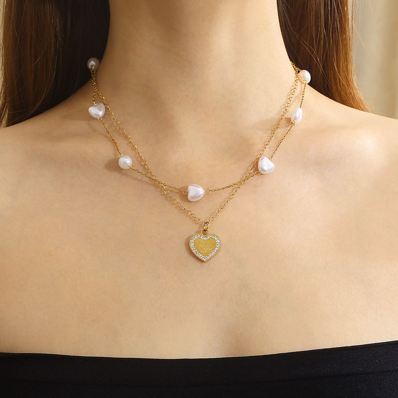 Acero Titanio Chapados en oro de 18k Estilo Simple Estilo Clásico Embutido Forma De Corazón Diamantes De Imitación Aretes Collar