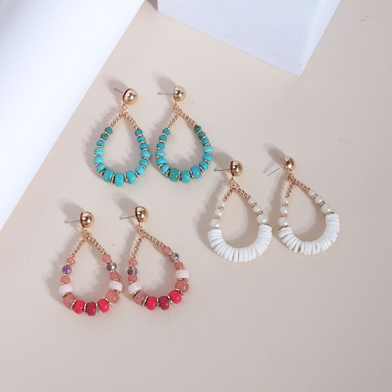 1 Pair Ethnic Style Streetwear Water Droplets Plating Beaded Synthetic Resin Shell 18k Gold Plated Drop Earrings