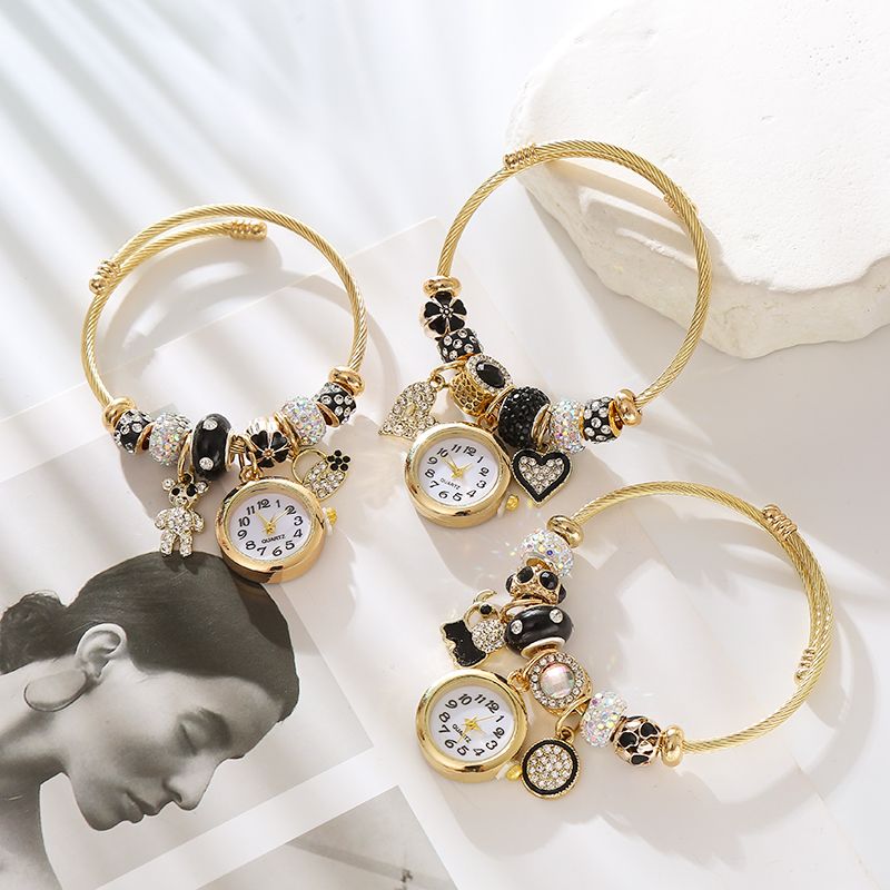 Lindo Forma De Corazón Reloj Acero Inoxidable Aleación Enchapado Embutido Diamantes De Imitación Chapado En Oro Mujeres Brazalete