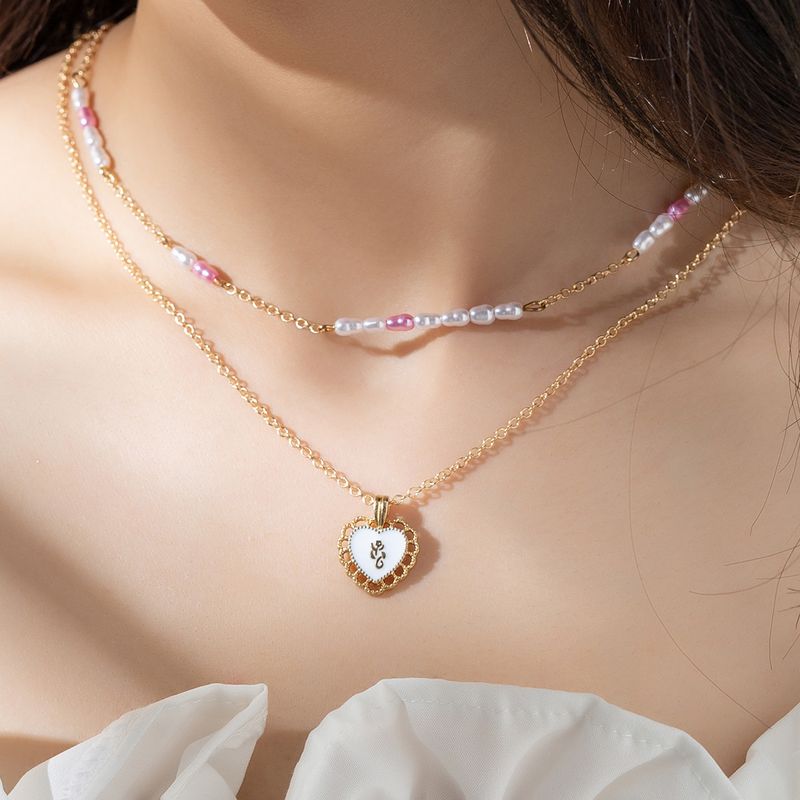 Elegant Heart Shape Alloy Plastic Women's Layered Necklaces