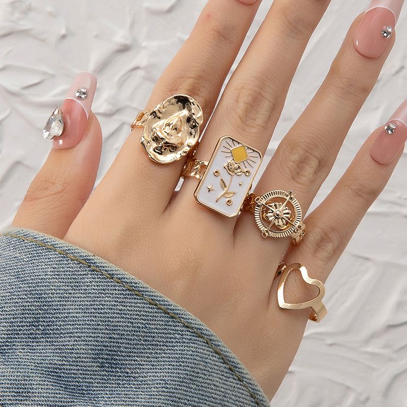 Ig Style Elegant Geometric Alloy Stone Plating Inlay Artificial Gemstones Gold Plated Women's Rings