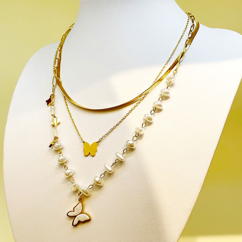 Edelstahl 304 Künstliche Perle 14 Karat Vergoldet Elegant Vintage-Stil Geschichtet Emaille Überzug Schmetterling Hülse Dreilagige Halskette