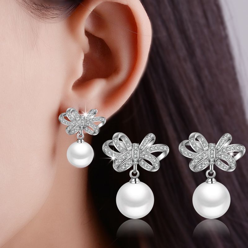 1 Pair Cute Sweet Bow Knot Plating Inlay Copper Pearl Zircon White Gold Plated Drop Earrings