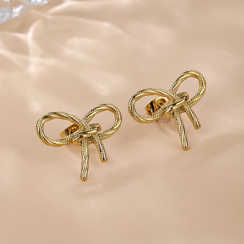 1 Pair Simple Style Classic Style Solid Color Bow Knot Plating Titanium Steel 18k Gold Plated Ear Studs