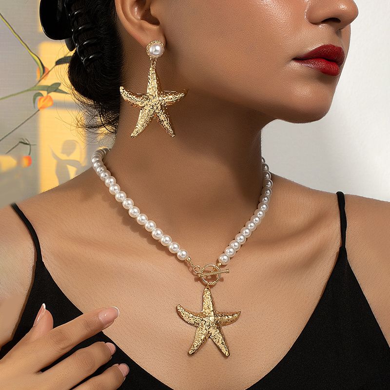 Estilo De Hadas Elegante Estrella De Mar Aleación El Plastico Ferroaleaciones Enchapado Chapado En Oro De 14 Quilates. Mujeres Aretes Collar