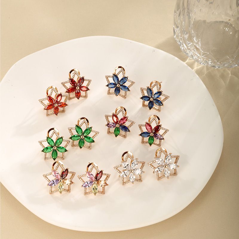 1 Pair Elegant Lady Xuping Star Petal Plating Inlay Copper Alloy Artificial Gemstones 18k Gold Plated Ear Studs