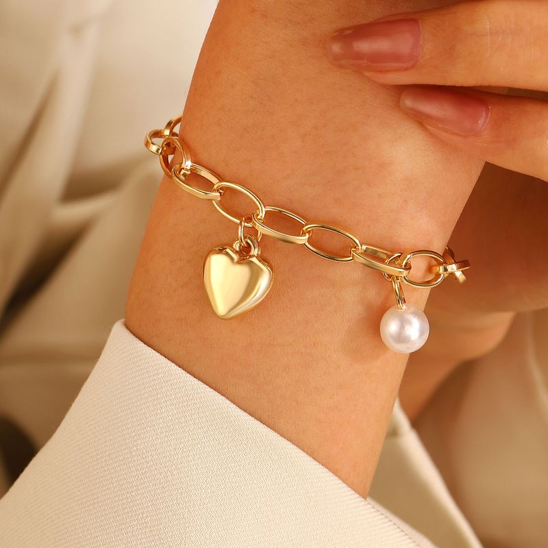 Einfacher Stil Pendeln Herzform Vergoldet Legierung Großhandel Armbänder