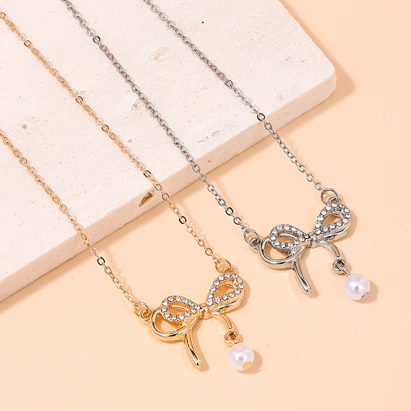 Ig Style Sweet Bow Knot Alloy Pearl Inlay Rhinestones Women's Necklace
