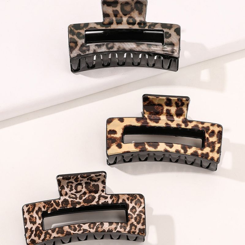 Frau Einfacher Stil Pendeln Leopard Kunststoff Aushöhlen Haarkrallen