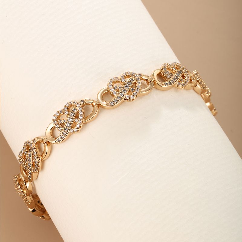 Elegant Xuping Infinity Heart Shape Alloy Copper Plating Inlay Artificial Diamond 18k Gold Plated Women's Bracelets