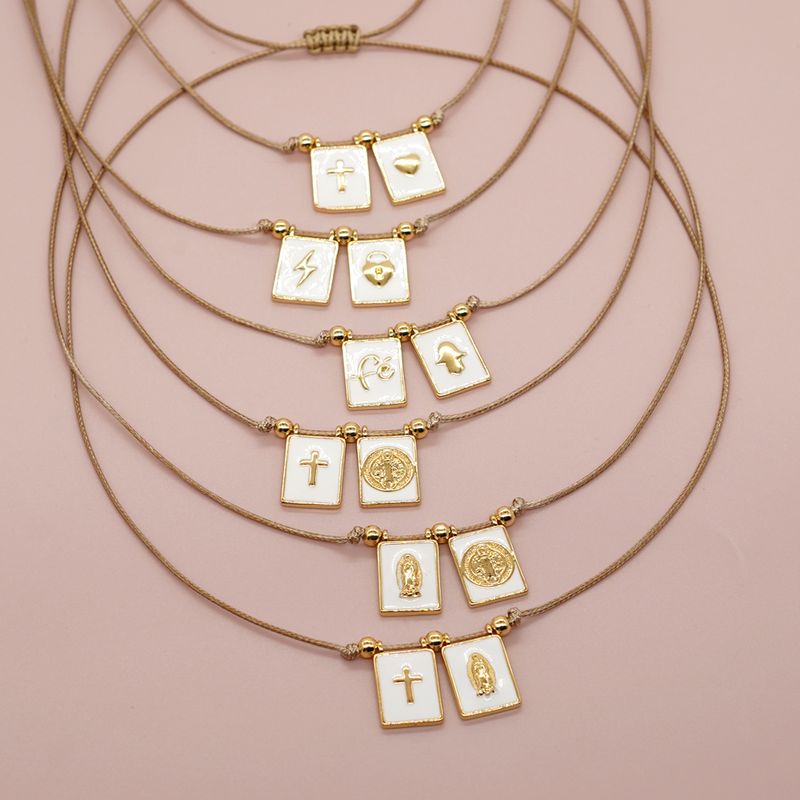 Elegant Klassisch Einfacher Stil Porträt Kreuzen Herzform Kupfer Überzug Inlay Hülse 18 Karat Vergoldet Halskette Mit Anhänger
