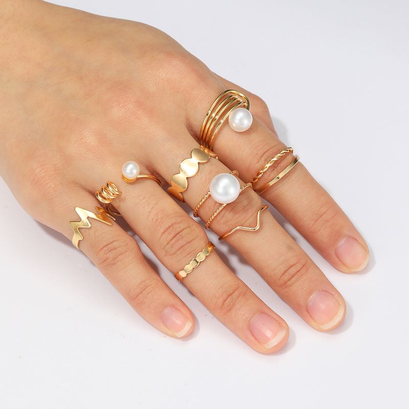 8 Pieces Fashion Round Lightning Alloy Inlay Pearl 18k Gold Plated Women's Rings
