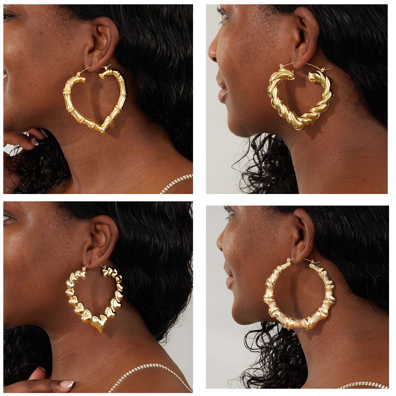 1 Pair Exaggerated Heart Shape Plating Iron Hoop Earrings