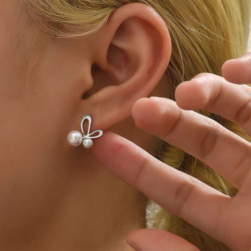 Style Simple Papillon Acier Inoxydable Incruster Perles Artificielles Des Boucles D'oreilles 1 Paire