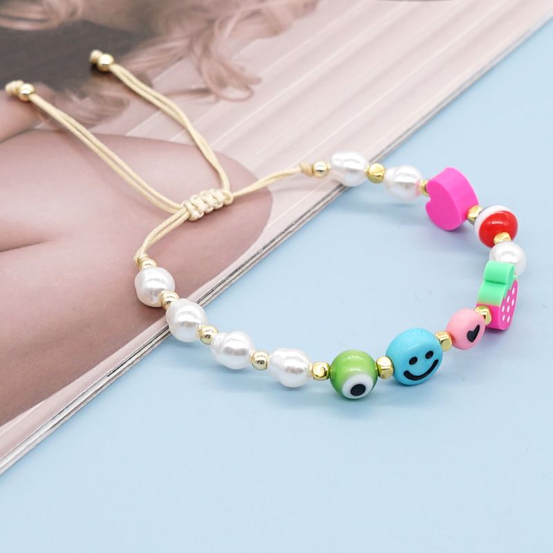 Simple Style Heart Shape Smiley Face Arylic Imitation Pearl Soft Clay Beaded Unisex Bracelets
